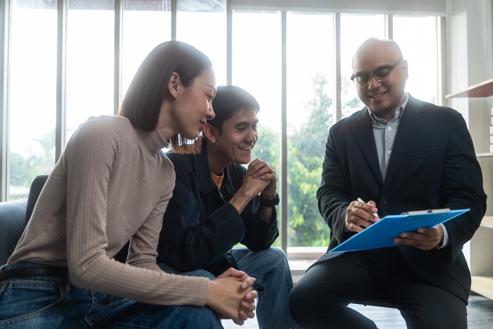 A couple learns about new citizenship by investment programs
