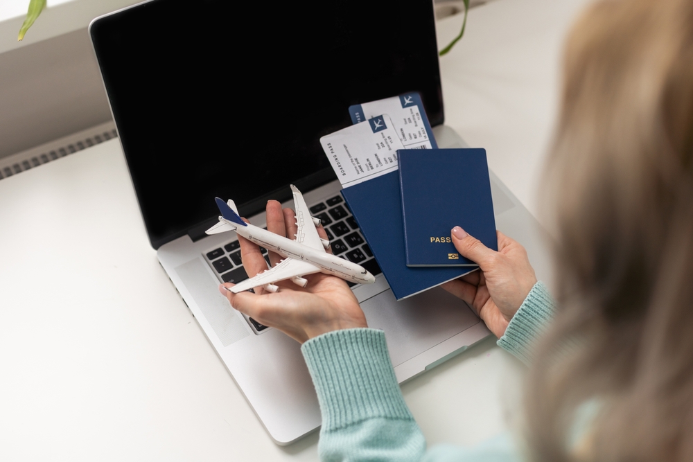 Positive,Happy,Woman,Going,On,Summer,Holidays,,Sitting,At,Office Having many citizenships provides more travel opportunities