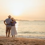 A retired couple at the beach