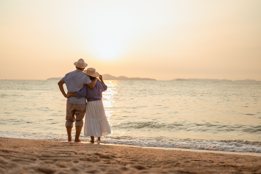 A retired couple at the beach